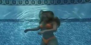 Sexy bikini girl drowning underwater