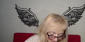 Blonde MILF IngritSno with glasses performs on webcam clothed