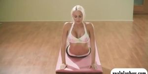 Khloe Terae teaches some yoga techniques with two women