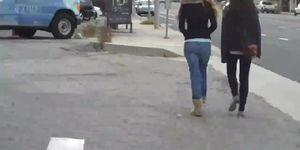 ass and a butt in jeans walking