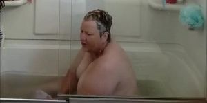 Fat Grandma Chrissy Krug rubs one off in the bath tub again.