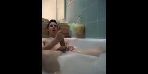 Twink jerking off in bathtub