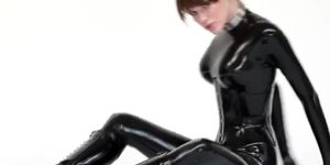 Beautiful Latex model in catsuit and ballet boots