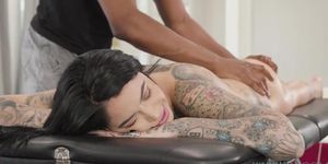 Tattooed Brunette Leigh Raven's Interracial Encounter with a Well-Endowed Masseur