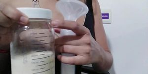 Sexy Brazilian women teaching how to pump her tits for milk (lactation)