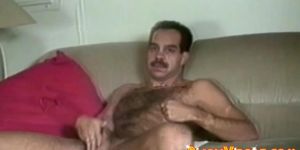 Retro hairy stud jerks off passionately before cumming solo