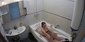 Bath couple kissing