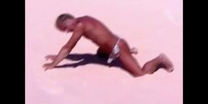 Tanned guy on beach in tiny string thong (temporarily!)