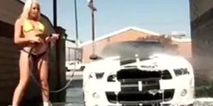 This gorgeous blondie gives full car wash service