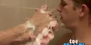 Horny twinks love to shower toe sucking and masturbating