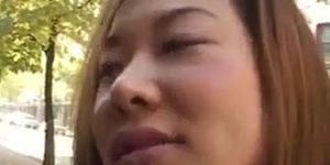 Slender Asian MILF gets seduced and fucked doggy style