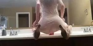 Beautiful Chick Rides Dildo In Front Of Mirror And Sucks It