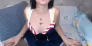 Asian cam girl in cos-play custom showing pussy