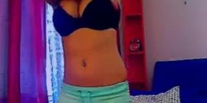 Hot brunette with hot boobs stripteasing on webcam