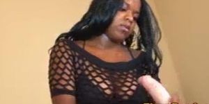 Fishnet ebony girl tugging with two hands
