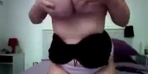 Buxom chick shakes her gigantic boobies on webcam