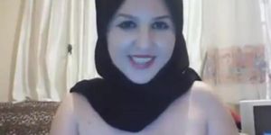Stirring Arab Woman Wearing Her Hijab