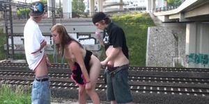 Blonde teen girl in railroad PUBLIC orgy gang bang in broad daylight
