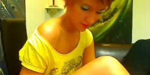 Short-haired girl flashes her body on webcam