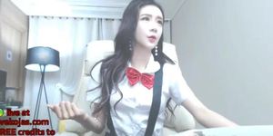 Korean girl fucks herself in uniform and tights