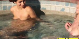 Cute lesbians Nina North and Ellena Woods get frisky in pool