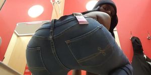 EBONY TRYING ON JEANS IN USA STORE
