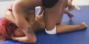 Two sweaty ebonies chics wrestling