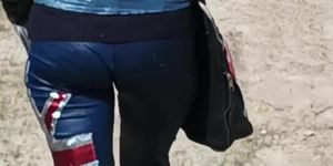 skinny girl in hot leggings walking on beach