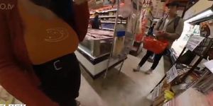 Trying To Show Her Boobs In Asian Market