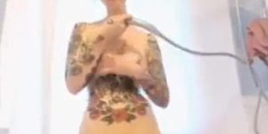 Tattooed Girl In The Bath Tub