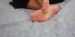 Shy Latina Rubbing Her Feet