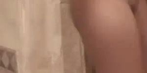 Massage girl rubs and kisses client in shower