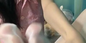 Cute Asian girl showing off mouth and spit