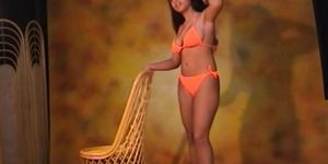 Busty Orange Bikini