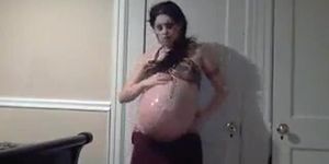 Pregnant Whore Strips Down