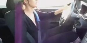 Girl gives handjob while driving