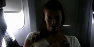 Hot blonde masturbates on a commercial flight