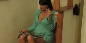 Cigarette Smoking Milf Gets Horny While Sitting On The Toilet