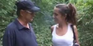 Old guy sucked by a milf in a forest