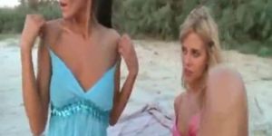 Horny lesbian girlfriends naked on beach
