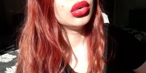 Big red glossy lips with sucking on cigarette and close up smoking