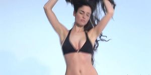 Sexy girl dances in black bikini
