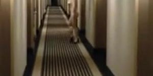 Blond lady walking nude in the hotel