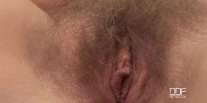 BANG.com - Blonde with light fluffy pussy hair uses a dildo during masturbation scene