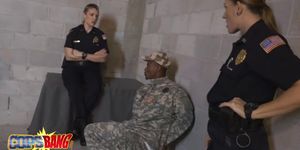 Black guy pleasing two busty cops