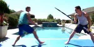 NEXT DOOR WORLD - Gay muscular jocks sword fighting by the pool
