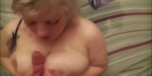 Busty MILF boobjob and facial