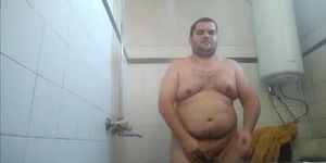 Sexy chubby guy taking a shower