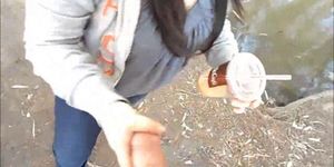 Asian Chick outdoors dick sucking