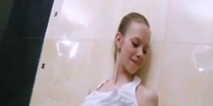 Ultra skinny chick soaping her body